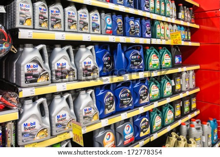 BUCHAREST, ROMANIA - JANUARY 22, 2014: Automobile Motor Oil On Supermarket Shelf On January 22, 2014 In Bucharest, Romania. It is an oil used for lubrication of various internal combustion engines.