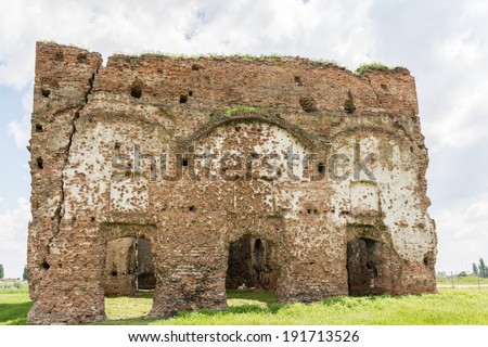 Old Ruins Of Chiajna Monastery In Romania. Built in 1792 Chiajna Monastery is a ruined church on the outskirts of Bucharest which is the subject of many legends including the story that it is cursed.
