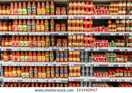 BUCHAREST, ROMANIA - MAY 08: Ketchup Tomato Sauce Bottles On Supermarket Shelf on May 08, 2014 in Bucharest, Romania.