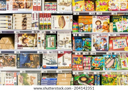 BUCHAREST, ROMANIA - JULY 09, 2014: Children Puzzle Games On Supermarket Stand.