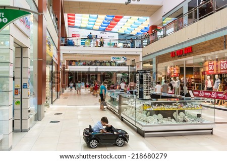 CONSTANTA, ROMANIA - AUGUST 05, 2014: People Shopping In Luxury Shopping Mall.
