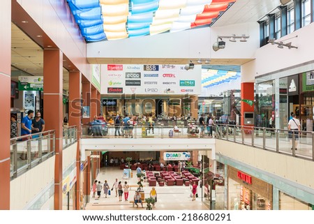 CONSTANTA, ROMANIA - AUGUST 05, 2014: People Shopping In Luxury Shopping Mall.
