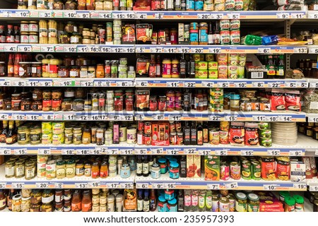 BUCHAREST, ROMANIA - DECEMBER 06, 2014: Canned Food And Special Sauces On Supermarket Stand.