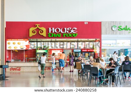 TIMISOARA, ROMANIA - AUGUST 24, 2014: People Crowd Eating Thailandese Food On Restaurant Floor In Luxurious Shopping Mall.