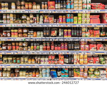 BUCHAREST, ROMANIA - JANUARY 20, 2015: Canned Food And Special Sauces For Sale On Supermarket Stand.