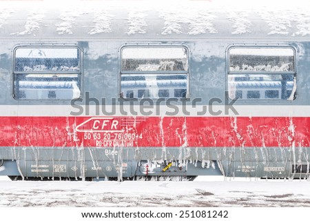 BUCHAREST, ROMANIA - DECEMBER 29, 2014: Ice Frozen Train During Heavy Snowfall In Bucharest North Railway Station.