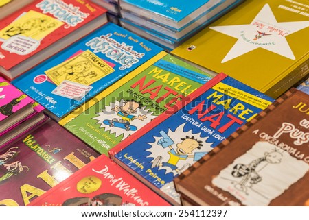 BUCHAREST, ROMANIA - FEBRUARY 15, 2015: Children Books For Sale On Bookshelf In Library.