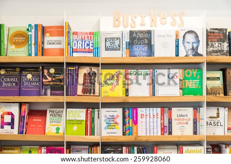 BUCHAREST, ROMANIA - MARCH 11, 2015: Business And Finance Books For Sale On Library Shelf.