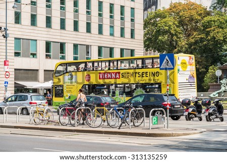 VIENNA, AUSTRIA - AUGUST 04, 2015: Vienna Hop On Hop Off City Tour Bus offers tourists visiting Vienna a complete tour of the most important landmarks in the city.