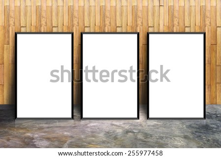 white frame on a Bamboo wall and concrete floor