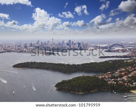 sydney city CBD and harbour bridge view from Helicopter across sydney sunny day Australia landmarks aerial hight