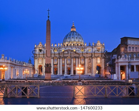 Vatican religion roman catholicism capital in Rome, Italy, st Peter\'s Basilica and square at sunrise facade and column illuminated blue sky