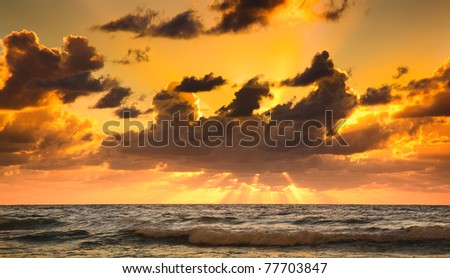 australia seascape sunrise gold sky clouds sunbeams colour panorama