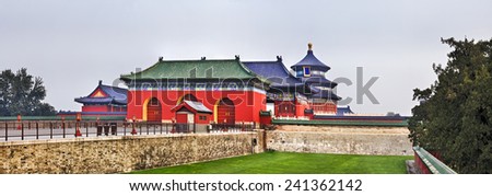 Ancient chinese imperial palace complex Temple of Heaven central round pagoda with surrounding gates, walls and buildings in panoramic view. Words in Chinese mean \