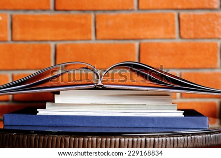 Books on Table, illustrating concept of education, printing industry and binding services etc.
