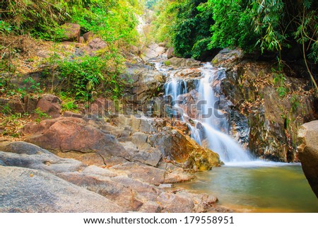 Waterfall in forest of Thailand National Park, in the dry season.