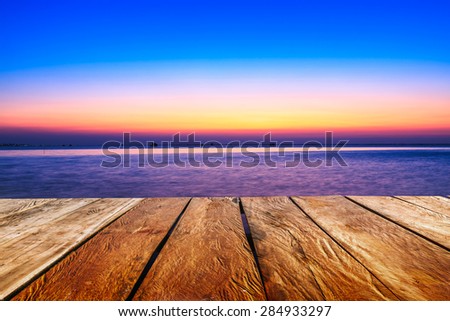 Wooden with  sunset evening  in sea with on sky clouds