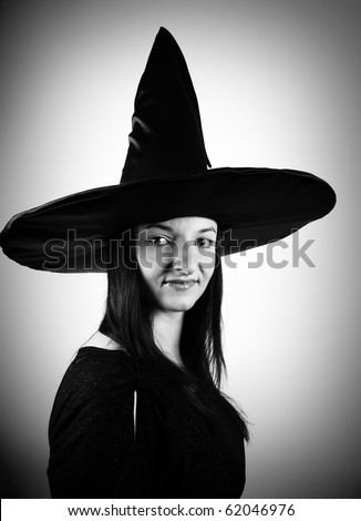 Young witch in black and white