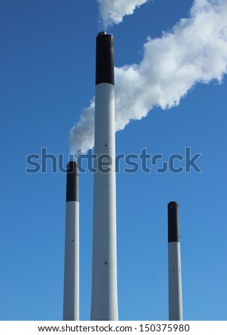 Isolated factory chimneys at energy plant