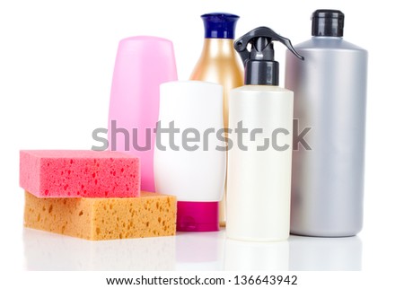 Sponge and cleaning items isolated on white