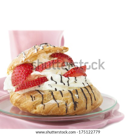 Cream Puffs with strawberries for Breakfast , pink  service on white background