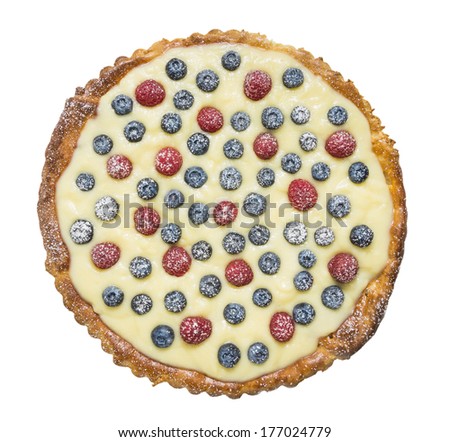 tart with raspberries, blueberries, vanilla custard and sugar powder, isolated