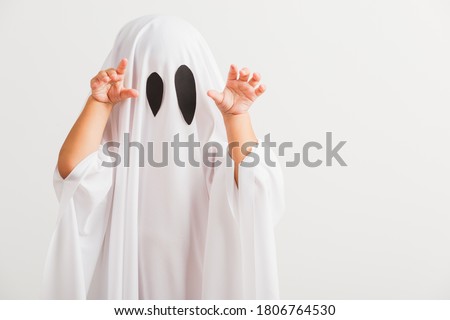 Similar – Image, Stock Photo Kid in ghost costume on street