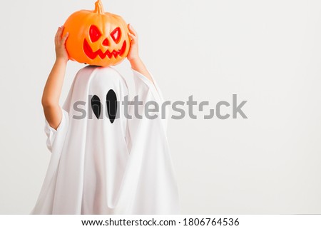 Similar – Image, Stock Photo Kid in ghost costume on street