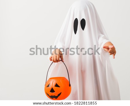 Similar – Image, Stock Photo Kid in ghost costume on street