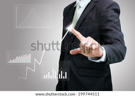 Businessman standing posture hand touch graph finance isolated on over gray background