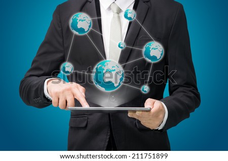 Businessman standing posture hand hold globe map on tablet isolated on blue background