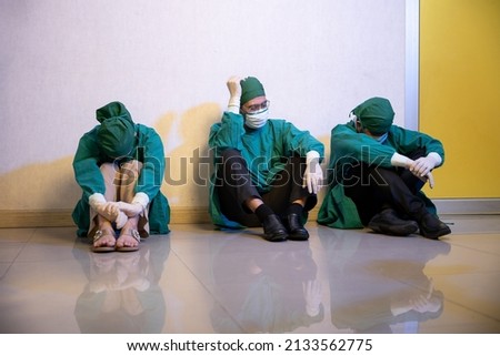 Image, Stock Photo Sad, exhausted doctor sitting in a dark room