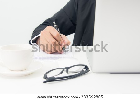 Businessman Sitting Working on Laptop on white background
