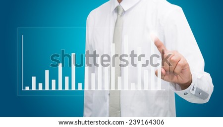 Businessman standing posture hand touch graph finance isolated on blue background