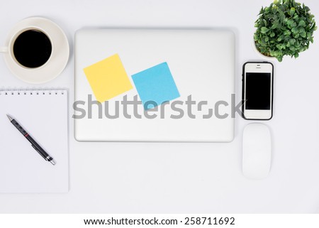 Top view close laptop or notebook workspace office on white table