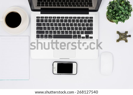 Top view laptop or notebook workspace office on white table