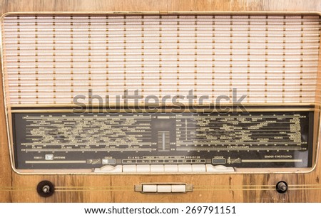 Old radio receiver of the last century isolate on over white background