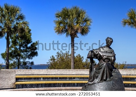 Mount Pleasant, SC. USA. April 10, 2015. The grieving lady sculpture by Raymond Kaskey is the centerpiece of the park in Mount Pleasant, SC. It is dedicated to fallen veterans of the military.