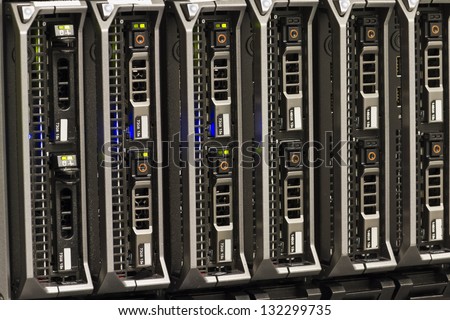 Blade servers in a blade chassis in a rack. Shot in a data center.