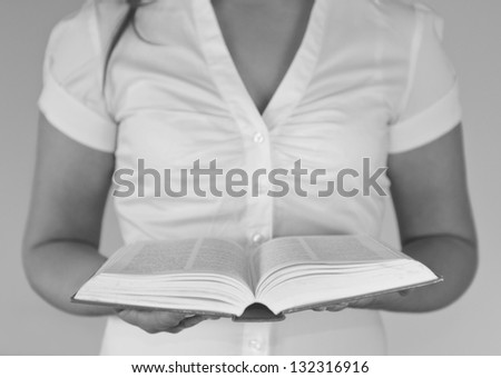 Woman reading the bible. Christian girl reading the holy bible.