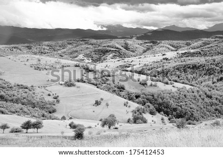 Mountain landscape with mountains in the distance, black and white