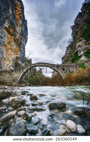 Old stone bridge in Zagorohoria, winter time