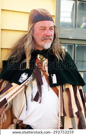 HASTINGS, UK - MAY 04, 2015: Man wears medieval costume during the Jack in the Green festival in Hastings, UK