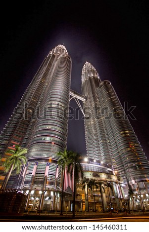 KUALA LUMPUR - CIRCA OCT. 2011: Petronas Twin Towers during night circa October 2011 in Kuala Lumpur, Malaysia. Petronas Towers are twin skyscrapers and were tallest buildings in the world until 2004.
