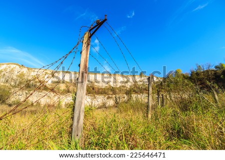 A piece of electric fence in a former Nazi work camp in Cracow Krzemionki, Poland. Camp was used as a plan for a Steven Spielberg\'s movie:\
