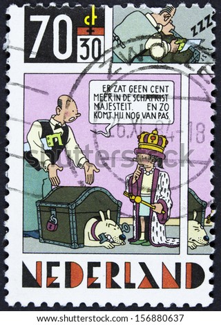 NETHERLANDS - CIRCA 1984 A stamp printed in Netherlands shows Strip Cartoons -The king and money chest, circa 1984  (2)