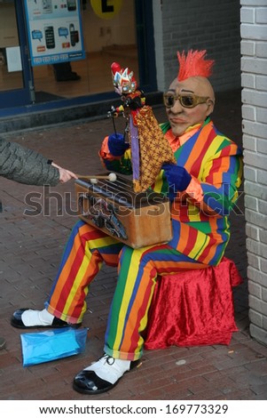 NIJMEGEN, THE NETHERLANDS - JANUARY 29 : Colored street performer playing a musical instrument on january 29, in Nijmegen, The Netherlands.