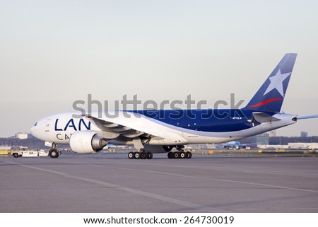 AMSTERDAM, THE NETHERLANDS - FEBRUARY 18, 2015 :.Just arrivedBoeing 777 cargo plane from lan cargo on schiphol airport. On february 18 , 2015 in Amsterdam, Holland.