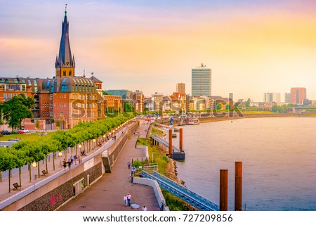 Similar – Foto Bild Blick auf die Düsseldorfer Skyline bei Sonnenuntergang