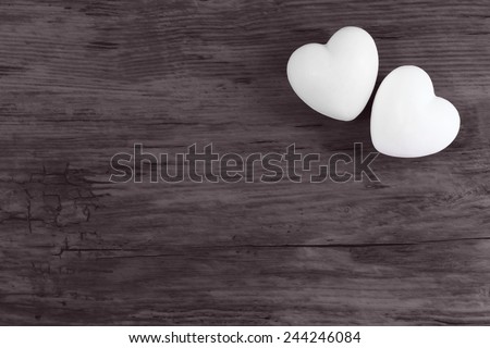 Couple of love white hearts on wooden dark background - valentines - mothers day - fathers day - wedding invitation - card - space for text